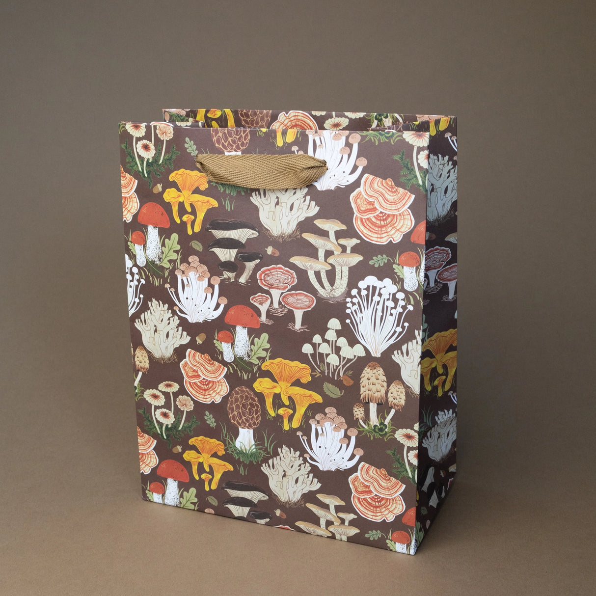 Botanica Paper Co. Medium Gift Bag - Mushrooms

Heavyweight uncoated paper stock&nbsp;
Printed in full color&nbsp;
Cotton ribbon handles
Cardboard floor insert&nbsp;
Size: 8" x 10.25" x 4.25"