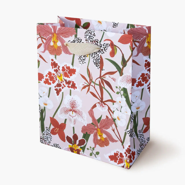 Botanica Paper Co. Small Gift Bag - Orchids

Heavyweight uncoated paper stock&nbsp;
Printed in full color&nbsp;
Cotton ribbon handles
Cardboard floor insert&nbsp;
Size: 5.5" x 7" x 3"