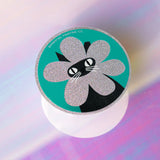 Product description
A black cat with a clipped ear wears a sparkly flower around their face. Truly, the rarest bloom. This 3" super sparkly glitter sticker is purrfect for adorning water bottles, laptops, and more. Watch how it catches the light!