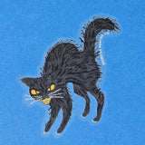 Hisss! Watch out for this Halloween black cat, all puffed up and showing its teeth! This 3" clear matte sticker is purrfect for adorning water bottles, laptops, and more.