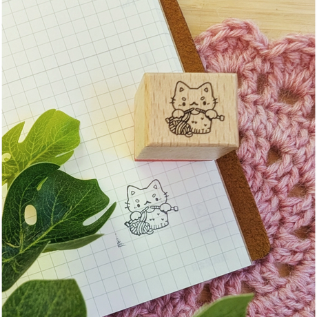 A small wood stamp of a little kitty knitting their heart away for your planner and scrapbooking needs. Each stamp measures approximately 1 x 0.75 inch.