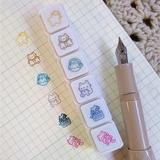 A tiny strip of button stamps to help you note your hobbies in your planner next year. Each stamp measures approximately 0.25 inches square and the full strip measures approximately 3.25 x 0.6 inches.