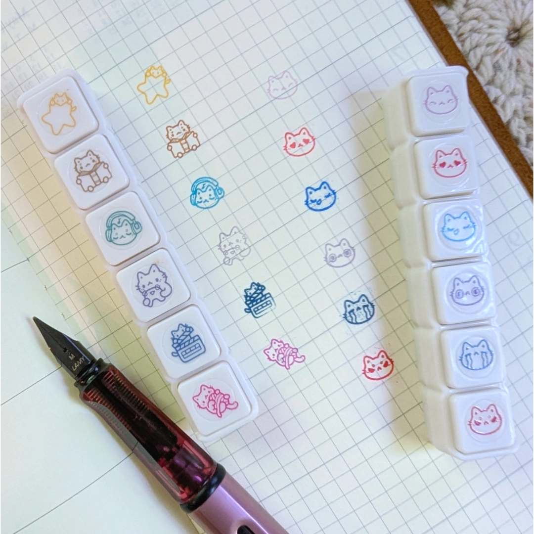 A tiny strip of button stamps to help you note your hobbies in your planner next year. Each stamp measures approximately 0.25 inches square and the full strip measures approximately 3.25 x 0.6 inches.