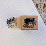 A small wood stamp of a little kitty with their yarn collection for your planner and scrapbooking needs. Each stamp measures approximately 1 x 0.75 inch.