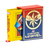 Carol Danvers, the super hero known to all as Captain Marvel, is one of the most powerful beings in the Marvel Universe. Now fans eager to learn more about her amazing adventures can follow her hero’s journey through the pages of this tiny storybook. Summarizing five decades of Captain Marvel’s comic book tales and featuring beautiful art from multiple eras, this unique collector’s item is the perfect gift for any Marvel fan!

AN EPIC SAGA IN THE PALM OF YOUR HAND: Covering 50 years of Captain Marvel’s hero