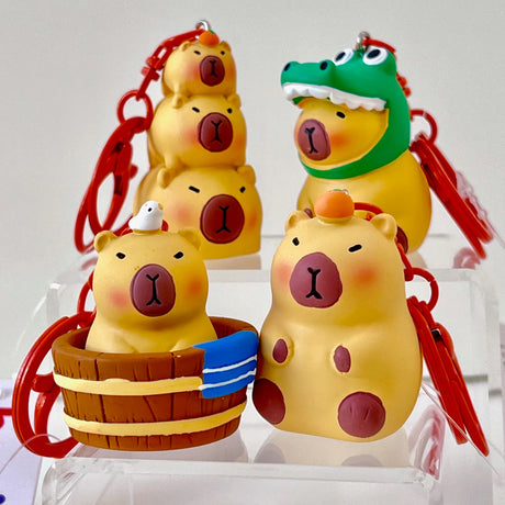 This adorable keychain adds personality wherever you go, whether clipped to your keys, bag, or backpack. Cute, lightweight, and easy to gift, it’s perfect for anyone who loves whimsical accessories or capybara-themed goodies.&nbsp;

Approx 2in x 2in
Includes 1 keychain&nbsp;