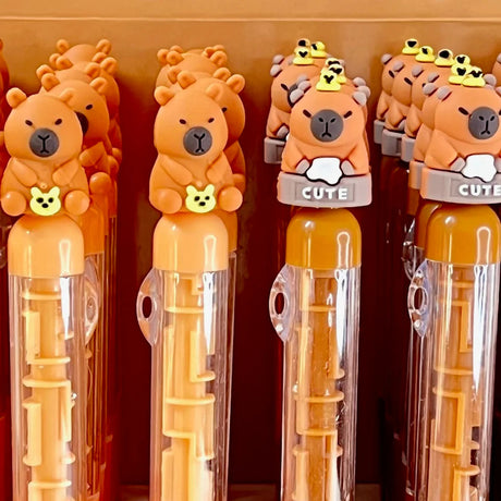 These cute capybara maze gel pens are perfect for planning, for work, home, desk or for school. They will be a beautiful and fun addition to your pen collection!


• 0.5mm Gel Ink
• Black Ink
• Writes very smoothly
• Measures approx. 6" - 7"
• Includes 1 pen, we will send one random color/design
