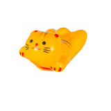 Porcelain yellow cat chopstick rest / pen rest.