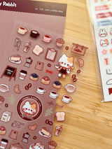 Clear transparent stickers! Decorate your planner / diary with these little stickers of a cat’s coffee shop ☕🐈✨

Kiss cut sticker sheet
1 sheet
Sheet size: 9 x 18 cm
Material: Clear PET