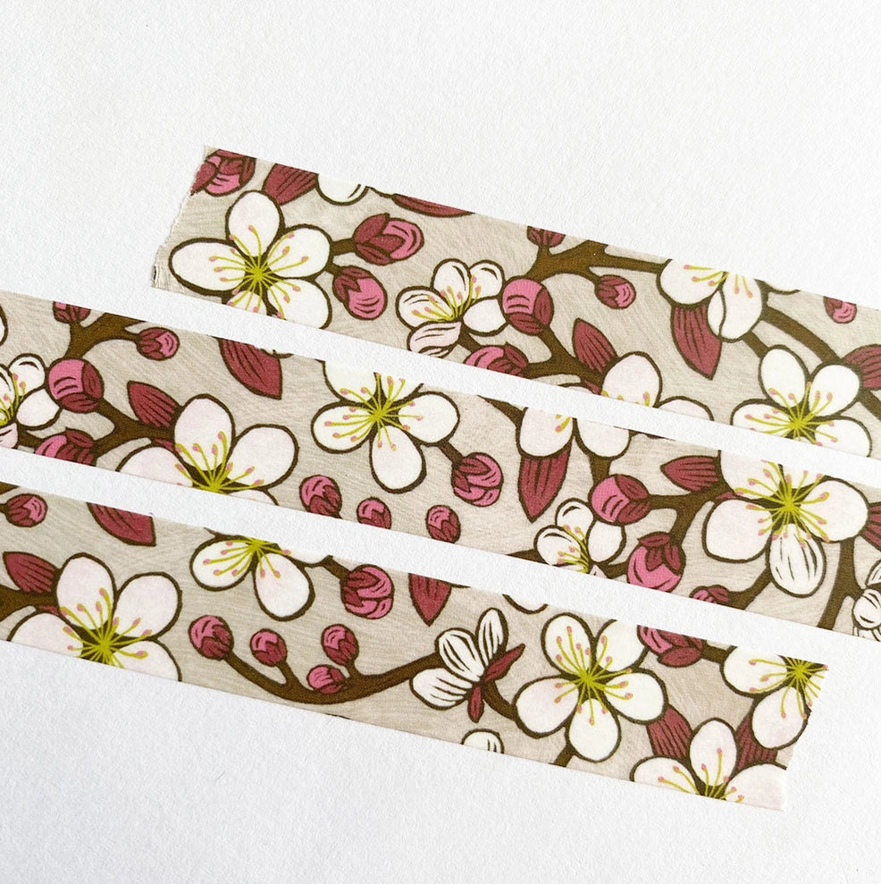 Our cherry blossom washi tape is a delicate pink tape created in celebration of our favorite early spring tree: the cherry blossom! This is a lightweight decorative tape printed on traditional rice paper. It is removable and leaves no residue, making it perfect for scrapbooking, stationery, crafts and more. Featuring a collection of complementary nature inspired designs that bring a pop of color to all your projects! Perfect for gifting and arts + crafts displays.

Tape dimensions: 15mm x 10m, or 0.59
