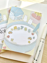 Chocolett - Cereal Memo-Pad

This memopad comes with 50 thick pages and measures 5.5 x 4 inches big. It’s cutely decorated with a little breakfast cereal scene and tiny bunnies.

Please note that these are not sticky notes.