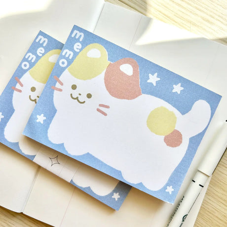 Chocolett - Kitty Memo Pad

This memopad comes with 50 thick pages and measures 5.5 x 4 inches big. It’s cutely decorated with a giant kitty for all your notes and memos.

Please note that these are not sticky notes.

Includes 1 memo pad