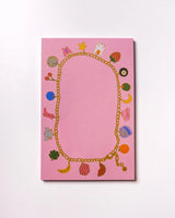 Charmed By Clem Notepad by Clem & Co.

Clem the Bun loves to make charm bracelets for all her friends! However, she kept forgetting which of her friends she had already given them to, so she made a notepad to keep track. Jot down things you don't want to forget either on this charming little notepad!