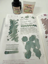 Coconut Milk Meow Meow Rolls 椰奶喵喵卷 is a dreamy mint‑turquoise ink that glows with gentle rose‑gold warmth where it pools.