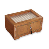 Our dramatic pen case for collectors, with new upgrades to accommodate larger styles. Part of the pleasure of being a pen lover is visual; a certain satisfaction ensues from being able to admire your favorites (and have others do the same). Our Lock and Key Pen Case offers more than an attractive space for displaying your prize pens—it also keeps your collection protected and free from dust. Unlock the wood inlay doors and lift the hinged protective glass lid to reveal the 4 drawers, each with 10 suede-line