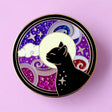 This amazing Cosmic Cat features a black cat against a celestial background, done in an Art Nouveau style. The purple and blue swirls are full of glitter – this fab pin is a real conversation starter!&nbsp;

The pin is secured by two purple heart backs and comes on a special ‘Art Nouveau’ Glitter Punk backing card, making it perfect for a gift or to keep as a special treat for yourself.

This pin is part of my Art Nouveau Cats collection – 8 enamel pins based on the fabulous 19th/20th century art movement.
