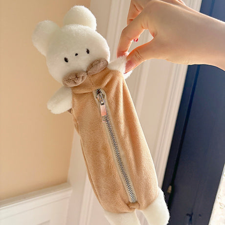 Keep your pens, pencils, and small essentials organized with this soft and fuzzy pencil pouch! With approximately 5.5 inches of storage space, it's perfect for carrying stationery, makeup brushes, or other daily must-haves. Its compact and lightweight design makes it easy to slip into your bag, while the sturdy zipper closure keeps everything secure.