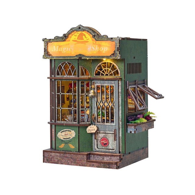 Build your own enchanted apothecary with this Magic Shop DIY kit-a charming miniature store packed with mysterious potions, glowing vials, and shelves brimming with spellbooks, recipe tomes, and dusty old encyclopedias. Every detail tells a story: bubbling brews, glowing glass jars, stacks of arcane books, and secret scrolls tucked into cozy corners.

2 AAA batteries required; batteries are not included.
Ages 14+
322 pieces
Assembled size: 4.5 x 3.9 x 7.4 inches