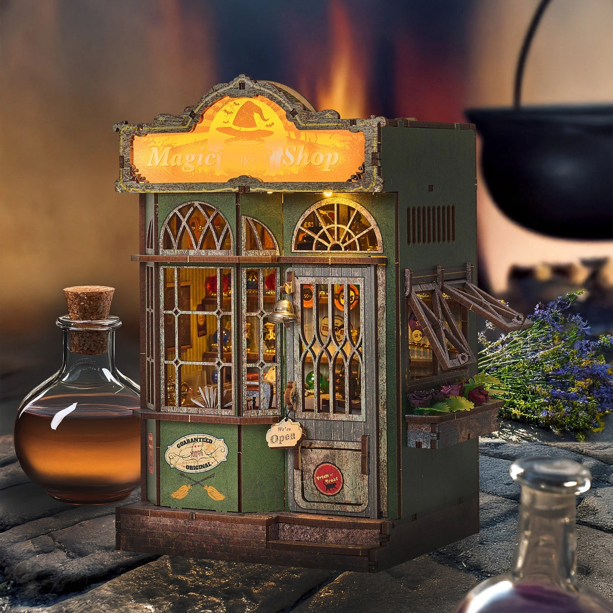 Build your own enchanted apothecary with this Magic Shop DIY kit-a charming miniature store packed with mysterious potions, glowing vials, and shelves brimming with spellbooks, recipe tomes, and dusty old encyclopedias. Every detail tells a story: bubbling brews, glowing glass jars, stacks of arcane books, and secret scrolls tucked into cozy corners.

2 AAA batteries required; batteries are not included.
Ages 14+
322 pieces
Assembled size: 4.5 x 3.9 x 7.4 inches