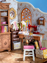 Immerse yourself in the delicate artistry of tailoring with this exquisite DIY miniature kit. Featuring finely crafted rolls of fabric, graceful ribbons, and an elegant dress poised upon a classic dress form, this kit invites you to create a sophisticated and enchanting tailor's room. Perfect for those who appreciate intricate craftsmanship, it beautifully captures the timeless charm of a bespoke workspace in miniature.

2 AAA batteries required; batteries are not included.
Ages 14+
322 pieces&nbsp;
Assembl