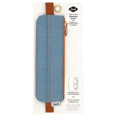 Denim Distressed Blue Notebook Pouch

Keep your go-to notebook and must-have pens together with our Denim Blue Notebook Pouch (honestly, we should’ve made these sooner). Designed with a fabric front, PU back, and a fully nylon-lined interior, it features an elastic band that fits snugly around most notebooks—so you’re ready for everyday ideas on the go.

Vegan Leather Pouch with Zipper
Elastic Fits Books up to 9" High
Zipper closure
9" x 3.75"