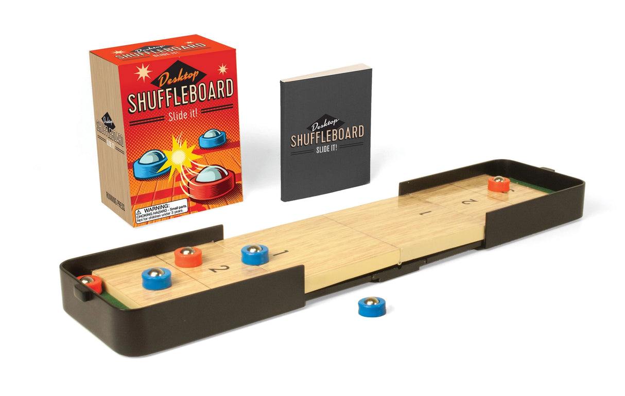 Desktop Shuffleboard serves as the perfect game night addition, travel game, or office distraction!

This portable miniature set includes:

12" extendable shuffleboard platform, with 2 table inserts
6 (3 red and 3 blue) weighted pucks
Shuffleboard stickers
32-page book with trivia and rules of desktop shuffleboard