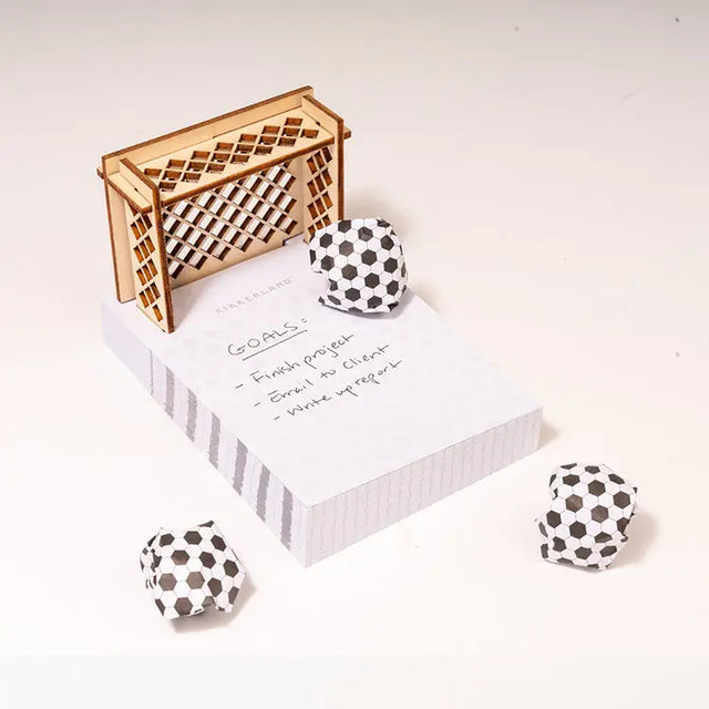 200 sticky notes transform into soccer balls when crumpled. Includes a mini plywood soccer goal for fun, interactive note-taking.

• Designer: Hector Serrano
• Material: paper, plywood
• color box (notepad) 3.5 x 4.75 x 0.75
• (goal) 3 x 3.25 x 1
• assembled 3.5 x 6 x 1.25