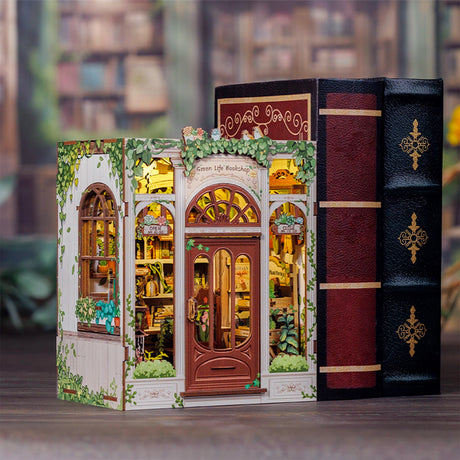 Bring the peaceful charm of a plant-filled bookstore to life with the Green Life Bookshop DIY book nook kit. Overflowing with greenery, potted plants, and botanical treasures, this enchanting miniature scene captures the magic of a cozy bookshop where nature and literature thrive together.