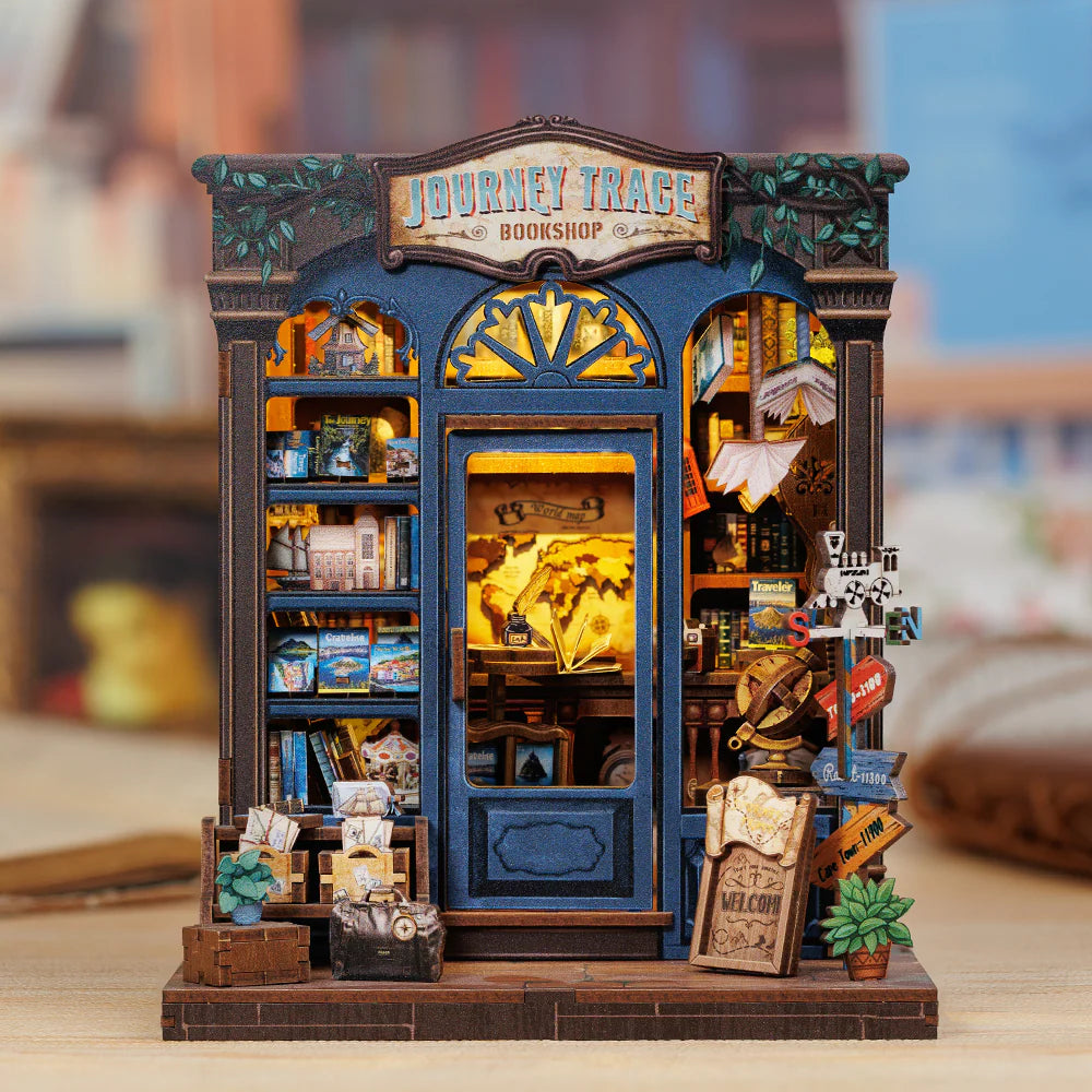 Inspired by the notion that "the meaning of travel is sharing," this charming book nook kit celebrates the power of storytelling, souvenirs, and cultural exchange. Visitors to this cozy bookshop explore a treasure trove of travelogues, handwritten postcards, globes, and keepsakes-each one brimming with whispered adventures from around the world. Let this miniature scene ignite your wanderlust, one tiny story at a time.