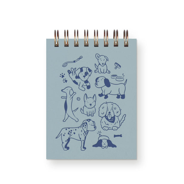 If petting a dog releases serotonin, then keeping this jotter close is the next best thing. Whether you have your own canine friend, or just love petting other's, this playful jotter will bring a smile every time you look at it. Use to scribble down notes, ideas, future dog names, and more.

Additional Details :

3”x4"
65 Unlined Interior Pages
Uncoated Vellum 70# Text Off-White Interior Paper
Bronze Wire-O Binding
Locally Made in Lawrence, Kansas