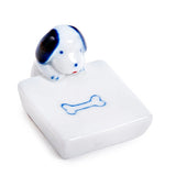 Porcelain dog and bone chopstick rest / pen rest.
