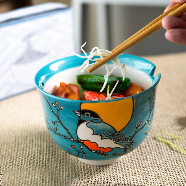 Donburi Bowl with Chopsticks Set Robin

Bowl Size: 5" Dia x 3.75"H
Chopsticks 9"L
Capacity: 18 fl oz
Origin: China