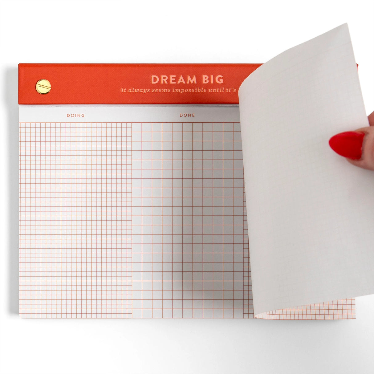 Turn your to-dos into ta-das with the Dream Big Notepad. This 6x8” desk pad features 75 grid pages organized into columns for Doing, Done, and Double-Checked—perfect for tackling big goals one step at a time. With smooth 120gsm paper, gold posts, and a bold red-orange header, it’s designed to keep you motivated and organized. The top-bound format and perforated pages make it easy to tear off and take with you. Ideal for goal-setters, planners, and productivity lovers. Makes a great gift for students, cowork