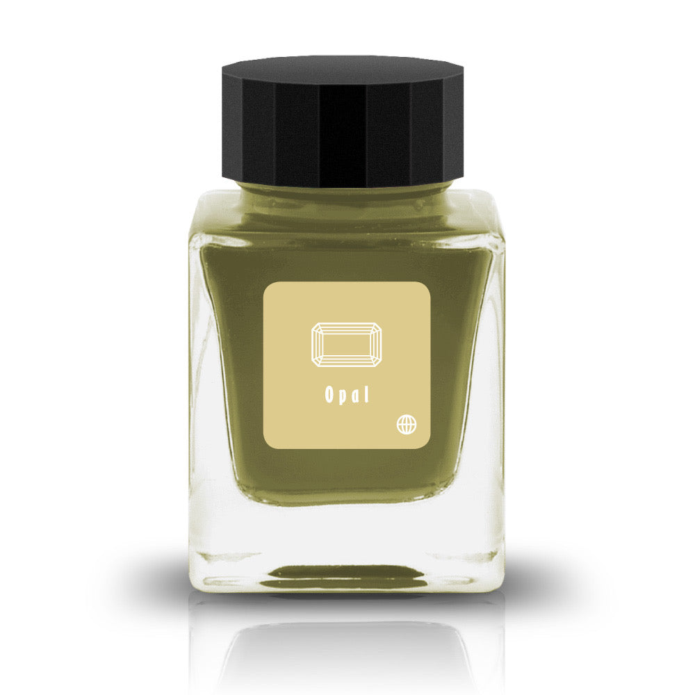 Embrace the bold and vibrant tones of nature through Tono &amp; Lims'&nbsp;Earth Contact Line. Inspired by rich gemstones, each ink color is perfect for those who enjoy adding radiance to their collection. Be sure to shake the bottle well before use to evenly disperse the glitter.

RGB: 221, 203, 141
Yellow
Shimmering
30 ml