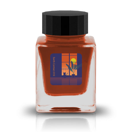 Embrace the bold and vibrant tones of nature through Tono &amp; Lims'&nbsp;Earth Contact Line. Inspired by rich gemstones, each ink color is perfect for those who enjoy adding radiance to their collection. Be sure to shake the bottle well before use to evenly disperse the glitter.

RGB: 205, 84, 29
Orange
Shimmering
30 ml