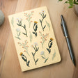Embroidered Butter Yellow Blooms Hardbound Notebook

Premium embroidered cover and beautiful cream-colored lined pages making it easy to keep track of even the smallest details. Complete with a rich, satin ribbon allowing you to bookmark your favorite pages and experiences.

5.75" x 8.25" hardcover journal notebook
Embroidered cover artwork
144 lined pages
Glorious Smythe-sewn binding allows notebook to lay flat
Ribbon Bookmark
Durable binding and high-quality paper for a premium writing experience
Ideal fo