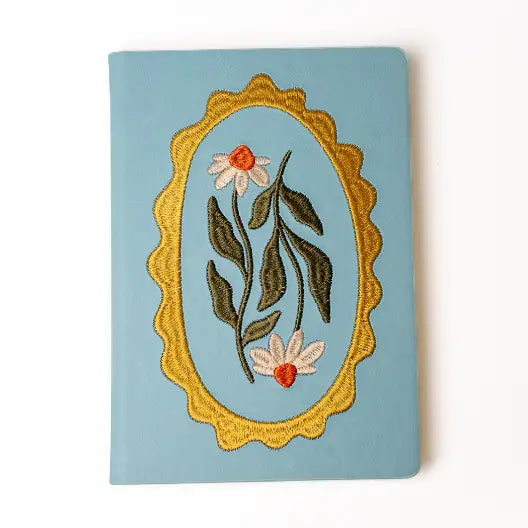 Embroidered Daisy Frame Hardbound Notebook

A premium hardcover notebook featuring precision embroidery on a vegan leather cover. Designed for everyday use, it includes smooth-lined pages, a Smythe-sewn layflat binding for effortless writing, and a satin ribbon to mark your place.

New inside page design
Soft Touch Embroidered Hardcover
5.75" x 8.25"
144 Lined Pages
Contrast Endpages
Satin Ribbon Bookmark &amp; Pen Loop