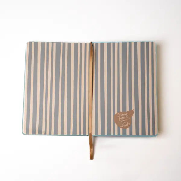 Embroidered Daisy Frame Hardbound Notebook

A premium hardcover notebook featuring precision embroidery on a vegan leather cover. Designed for everyday use, it includes smooth-lined pages, a Smythe-sewn layflat binding for effortless writing, and a satin ribbon to mark your place.

New inside page design
Soft Touch Embroidered Hardcover
5.75" x 8.25"
144 Lined Pages
Contrast Endpages
Satin Ribbon Bookmark &amp; Pen Loop