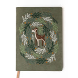Embroidered Deer Hardbound Layflat Notebook

Premium embroidered cover and beautiful cream-colored lined pages making it easy to keep track of even the smallest details. Complete with a rich, satin ribbon allowing you to bookmark your favorite pages and experiences.

5.75" x 8.25" hardcover journal notebook
Embroidered cover artwork
144 lined pages
Glorious Smythe-sewn binding allows notebook to lay flat
Ribbon Bookmark
Durable binding and high-quality paper for a premium writing experience
Ideal for gifts,