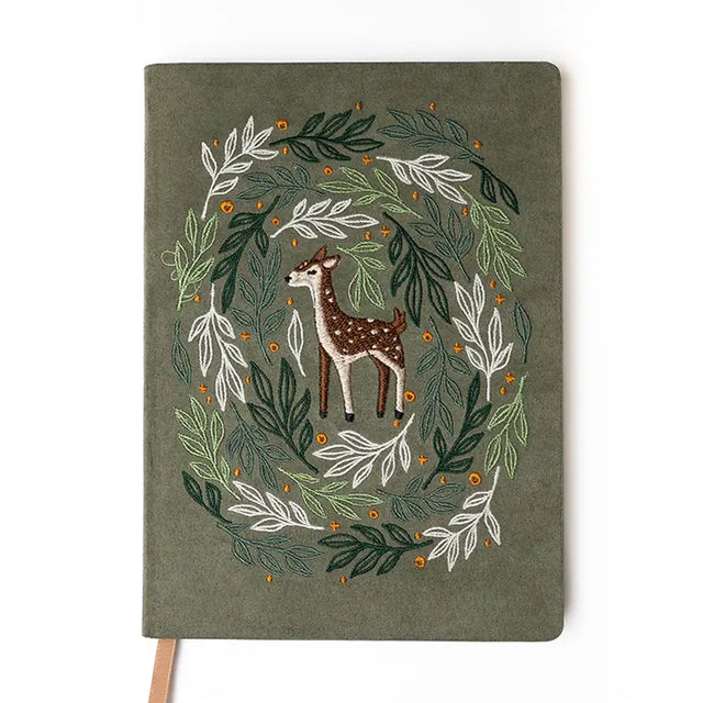 Embroidered Deer Hardbound Layflat Notebook

Premium embroidered cover and beautiful cream-colored lined pages making it easy to keep track of even the smallest details. Complete with a rich, satin ribbon allowing you to bookmark your favorite pages and experiences.

5.75" x 8.25" hardcover journal notebook
Embroidered cover artwork
144 lined pages
Glorious Smythe-sewn binding allows notebook to lay flat
Ribbon Bookmark
Durable binding and high-quality paper for a premium writing experience
Ideal for gifts,