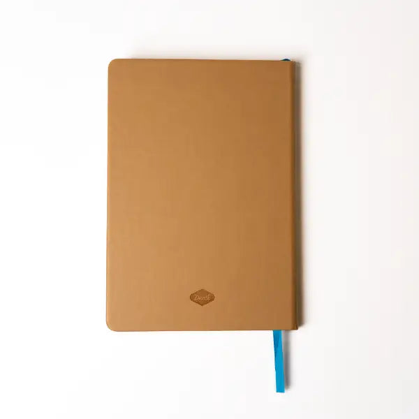 Embroidered Delphinium Flower Hardbound Notebook

A premium hardcover notebook featuring precision embroidery on a vegan leather cover. Designed for everyday use, it includes smooth-lined pages, a Smythe-sewn layflat binding for effortless writing, and a satin ribbon to mark your place.

New inside page design
Soft Touch Hardcover
5.75" x 8.25"
144 Lined Pages
Contrast Endpages
Satin Ribbon Bookmark &amp; Pen Loop