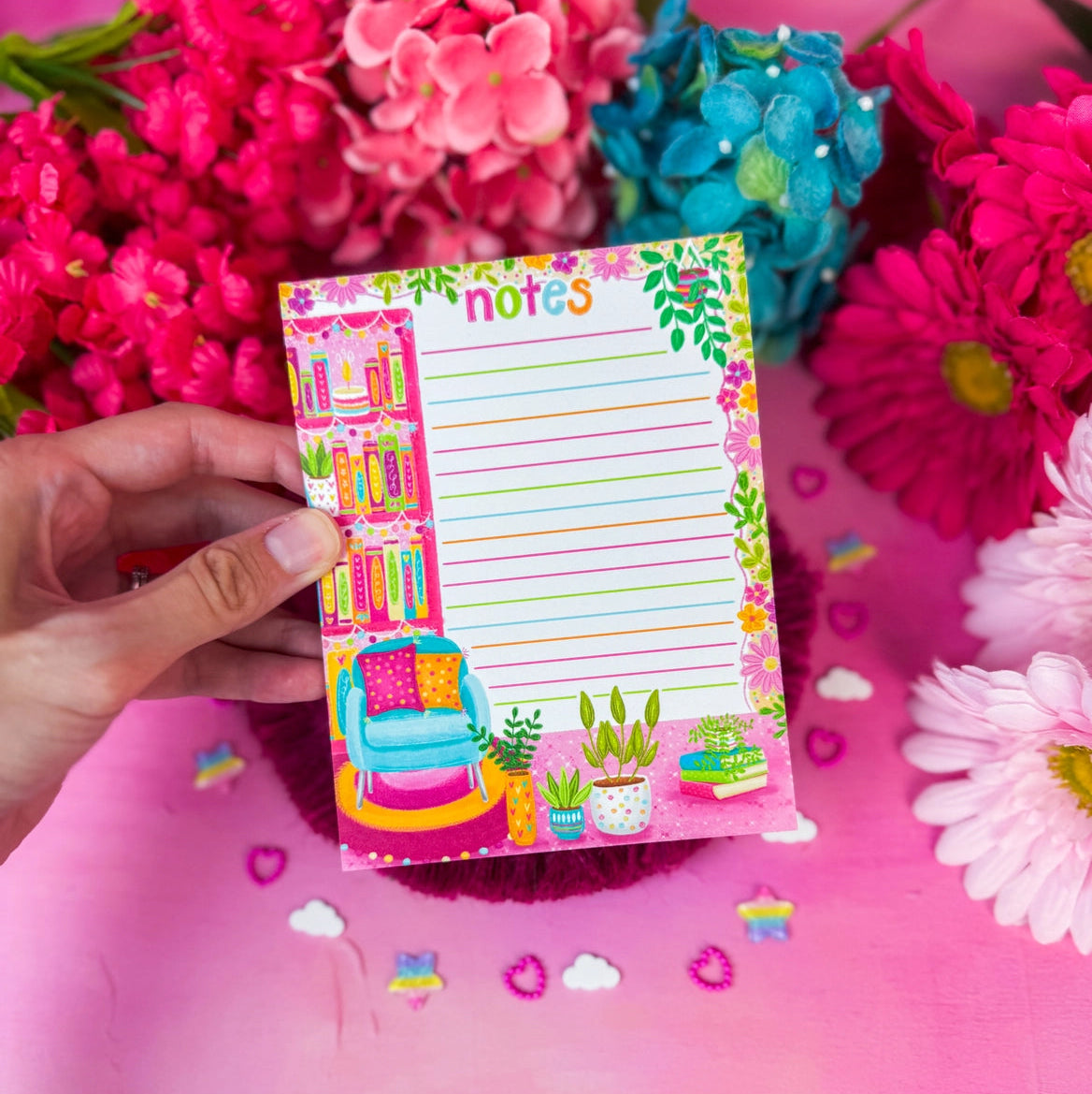 Stay organized in style with this adorable Cozy Plant Reading Nook Notepad! Perfect for jotting down your daily tasks, goals, and bookish ideas, this notepad brings a pop of personality to your desk.
