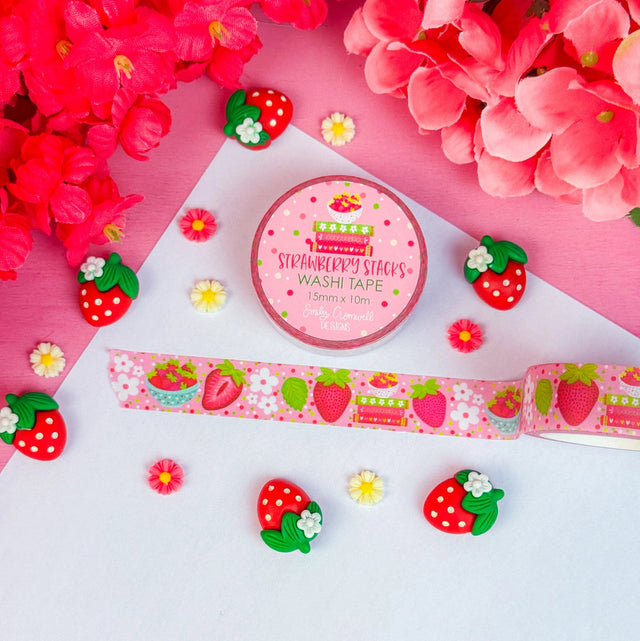 Add a pop of strawberry fun to your projects with our adorable Strawberry Stacks washi tape! Perfect for using in your planner, crafts, scrapbooking, and creative decorating, this cute washi tape sticks securely yet removes cleanly without damage.&nbsp;

Details:

Size: 15mm width x 10m length
Removable Washi Tape
Slightly Transparent
Features my hand drawn design as a repeat pattern
