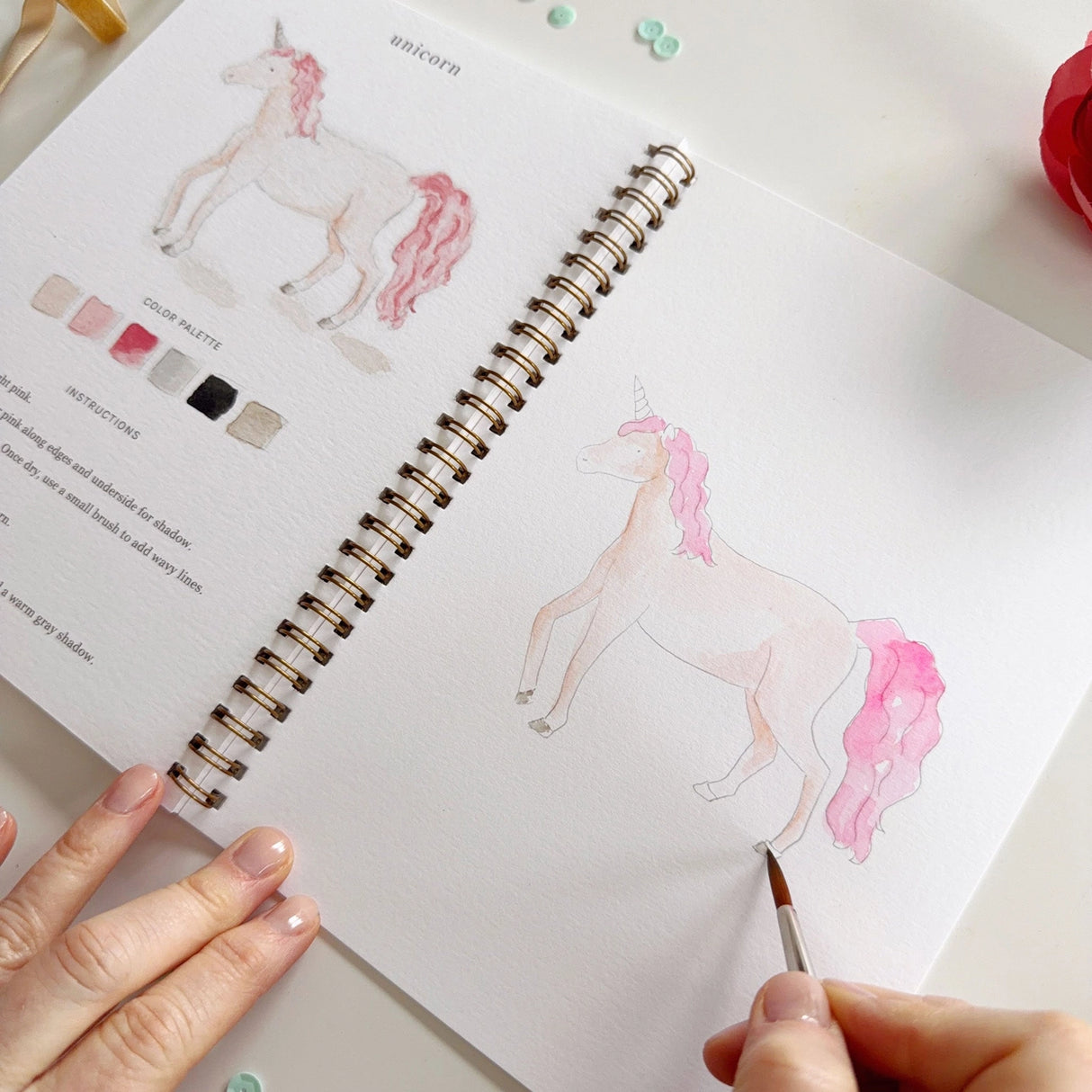 Twelve storybook illustrations — a princess, castle, dragon, mermaid, fairy, unicorn, and more — each pre-outlined with step-by-step instructions. Paintings take about thirty minutes from start to finish, making it a favorite for young painters and the grown-ups who paint alongside them.

12 beginner-friendly illustrations
Thick 120lb watercolor paper&nbsp;
Lay-flat pages with spiral binding for hassle-free painting and easy tear-out&nbsp;
Lightly outlined sketches to guide you&nbsp;
Easy to carry, travel-r
