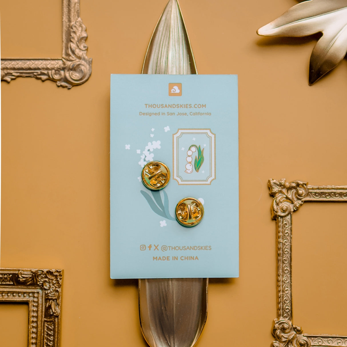 Thousand Skies Lily of the Valley Duckie Enamel Pin