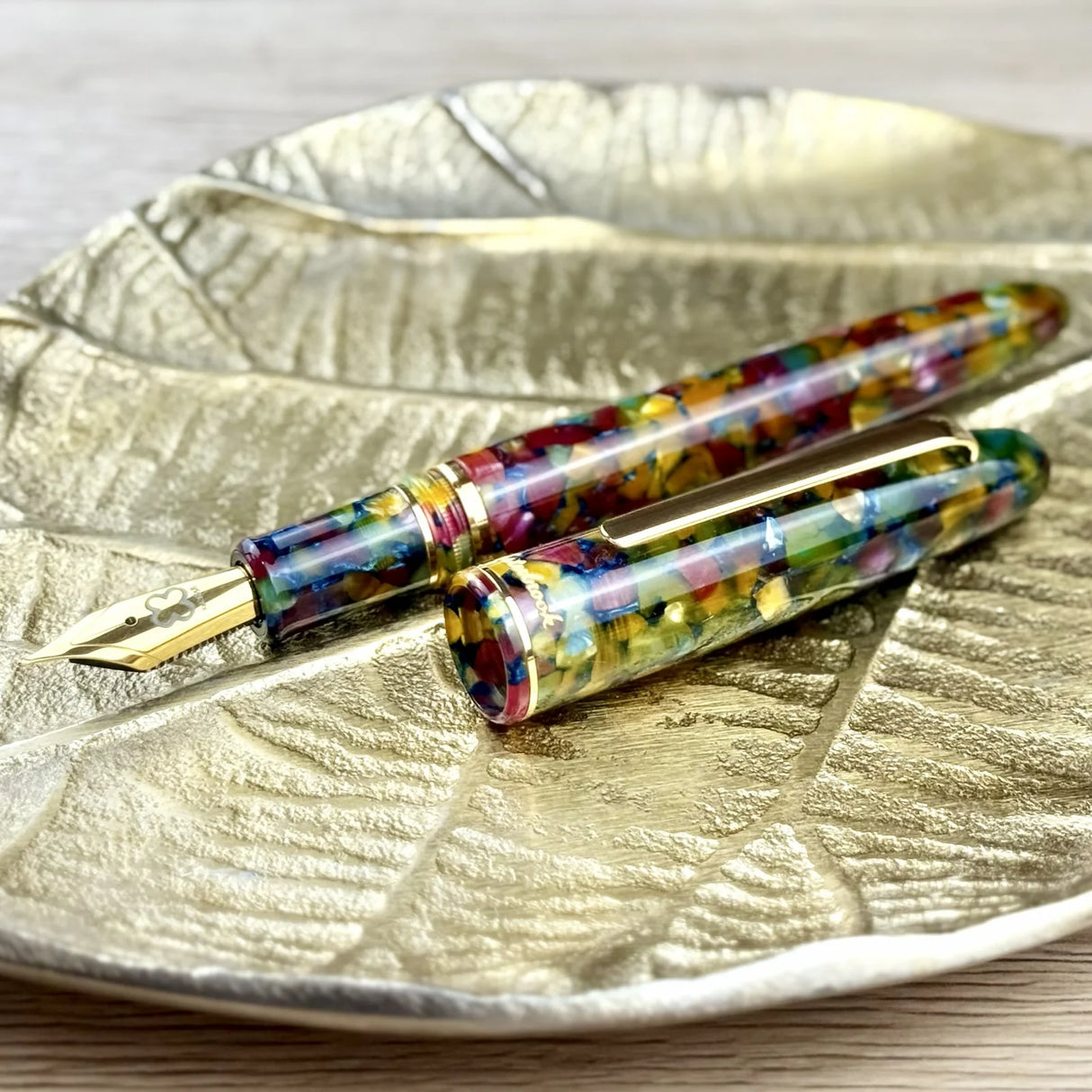 Inspired by lush gardens, the Botanical Garden Estie is a fountain pen that celebrates the beauty of nature. With intricate details and superior craftsmanship, this pen brings a touch of the outdoors to your writing, merging artistry and functionality in a way that is both elegant and practical.

The Esterbrook Estie features a German-manufactured nib by Jowo, known for its reliability and smooth performance. Each nib is carefully inspected by hand and marked with our logo and size indication for easy ident