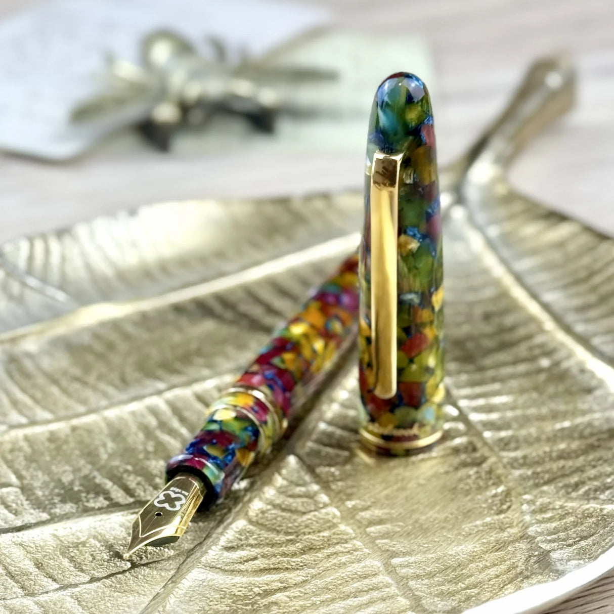 Inspired by lush gardens, the Botanical Garden Estie is a fountain pen that celebrates the beauty of nature. With intricate details and superior craftsmanship, this pen brings a touch of the outdoors to your writing, merging artistry and functionality in a way that is both elegant and practical.

The Esterbrook Estie features a German-manufactured nib by Jowo, known for its reliability and smooth performance. Each nib is carefully inspected by hand and marked with our logo and size indication for easy ident
