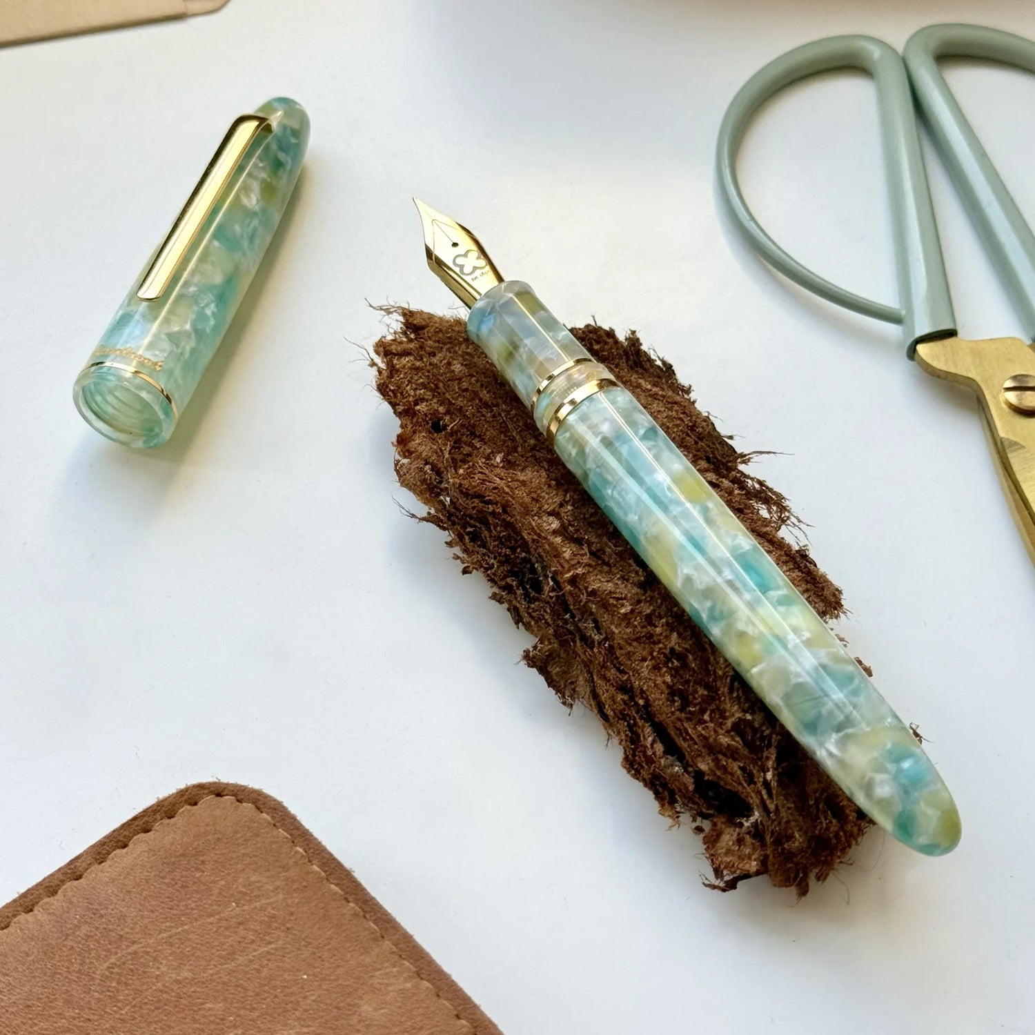 The Estie Sea Glass is inspired by the calming hues of the ocean, offering a serene writing experience with every use. Its smooth design and cool tones make it a unique addition to any collection, perfect for those who seek both tranquility and elegance in their writing tools.

The Esterbrook Estie features a German-manufactured nib by Jowo, known for its reliability and smooth performance. Each nib is carefully inspected by hand and marked with our logo and size indication for easy identification.


One of
