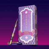 Esterbrook x Sakuradragon Sakura Street Estie Fountain Pen

Created with artist Cindy Duong of Sakuradragon, the Sakura Street Estie brings her imaginative illustrated world to Esterbrook's traditional Estie fountain pen. Its U.S.-blended material combines translucent purple with colorful glitter sparkle, while the custom clip is etched with Cindy's Sakura pattern. Dual Esterbrook and Sakuradragon engraving and a gold-plated converter finish the design. Each pen arrives in special packaging with Japanese gi