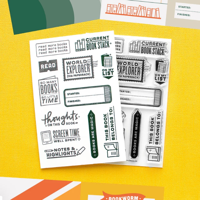 Here's a stamp set that is perfect for Bookworms, reading enthusiasts and those that love to journal about the titles that make the list. You can use this stamp set to not only help decorate your TBR list, but also to record your thoughts on the book you just finished.

Use this set for scrapbooking, Project Life, planners, travel journals and bullet journals! 4x6 clear stamp set, includes 12 stamps.